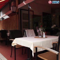 Salle du petit-déjeuner située dans le restaurant Alecsa am Olympiastadion