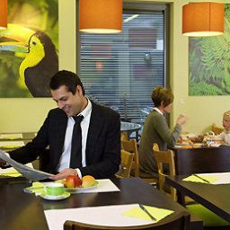 Sala colazione nel ristorante ibis Styles Antwerpen City Center (voorheen all seasons)