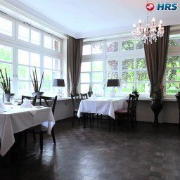 Sala de desayuno en el restaurante Am Schloss