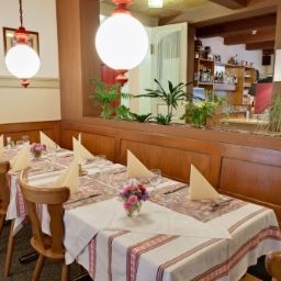 Breakfast room within restaurant Waldhotel Unspunnen