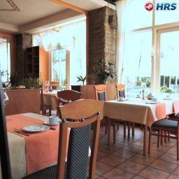 Sala de desayuno en el restaurante Saltenhof AKZENT Hotel