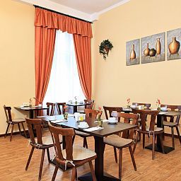 Sala de desayuno Cortina Hotel-Pension