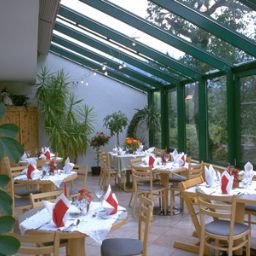 Salle du petit-déjeuner située dans le restaurant Feriengut Hotel Seiterhof Fotos