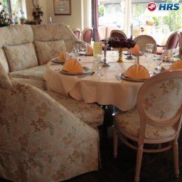 Breakfast room within restaurant Deutsches Haus Parkhotel