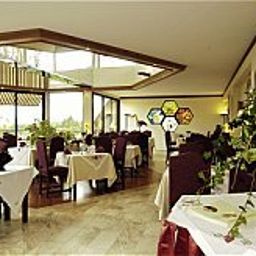 Sala colazione nel ristorante Le Beau-Site Chateaux et Hotels Collection Fotos