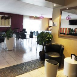 Salle du petit-déjeuner Kyriad Montpellier Sud Lattes