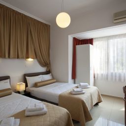 Habitación familiar Metropolis Hotel
