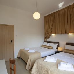 Habitación familiar Metropolis Hotel