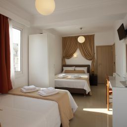Habitación familiar Metropolis Hotel