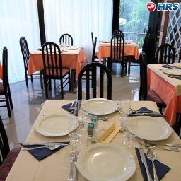 Sala de desayuno en el restaurante Gabry Fotos