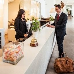 Recepción Cosmo Hotel Palace