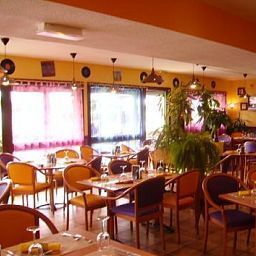 Sala colazione nel ristorante Balladins Valenciennes Aeroport