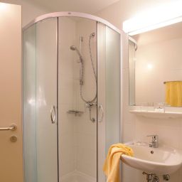Badezimmer AllYouNeed Hotel Salzburg