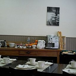 Salle du petit-déjeuner De la Basilique Logis