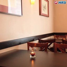 Salle du petit-déjeuner située dans le restaurant Abell