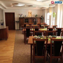 Sala de desayuno en el restaurante Bruy Domicil