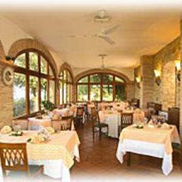 Sala de desayuno en el restaurante Poggio degli Olivi Fotos
