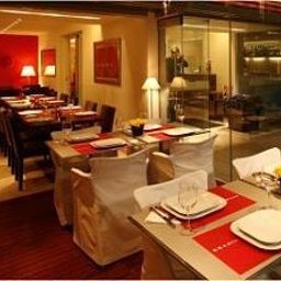 Sala de desayuno en el restaurante Brasil Suites