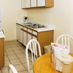 Chambre Emerald Suites Cameron