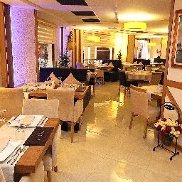 Sala de desayuno en el restaurante Levent Hotel Fotos