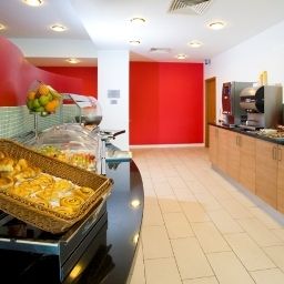 Breakfast room within restaurant Ramada Encore