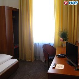 Chambre pour voyageurs d'affaires Carlton Astoria