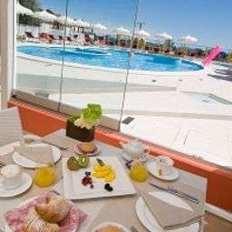 Sala de desayuno Baia del Mar Suite Hotel