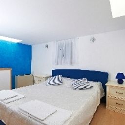 Camera per famiglie Tomi Apartments