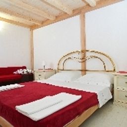 Camera per famiglie Tomi Apartments