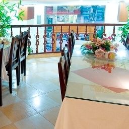 Sala de desayuno en el restaurante The Jasmine Hotel