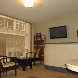 Холл Mono Suites Hotel
