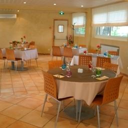 Salle du petit-déjeuner située dans le restaurant Le Poseidon