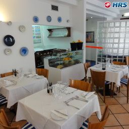 Breakfast room within restaurant Residencial Amparo Fotos