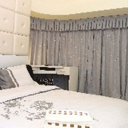 Suite Home World Hotel