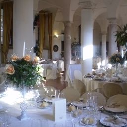 Sala de desayuno en el restaurante Relais 12 Monaci