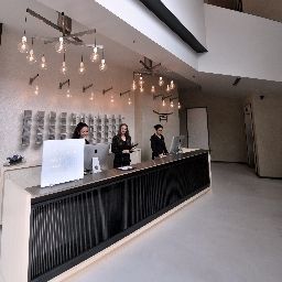 Recepción NU Hotel