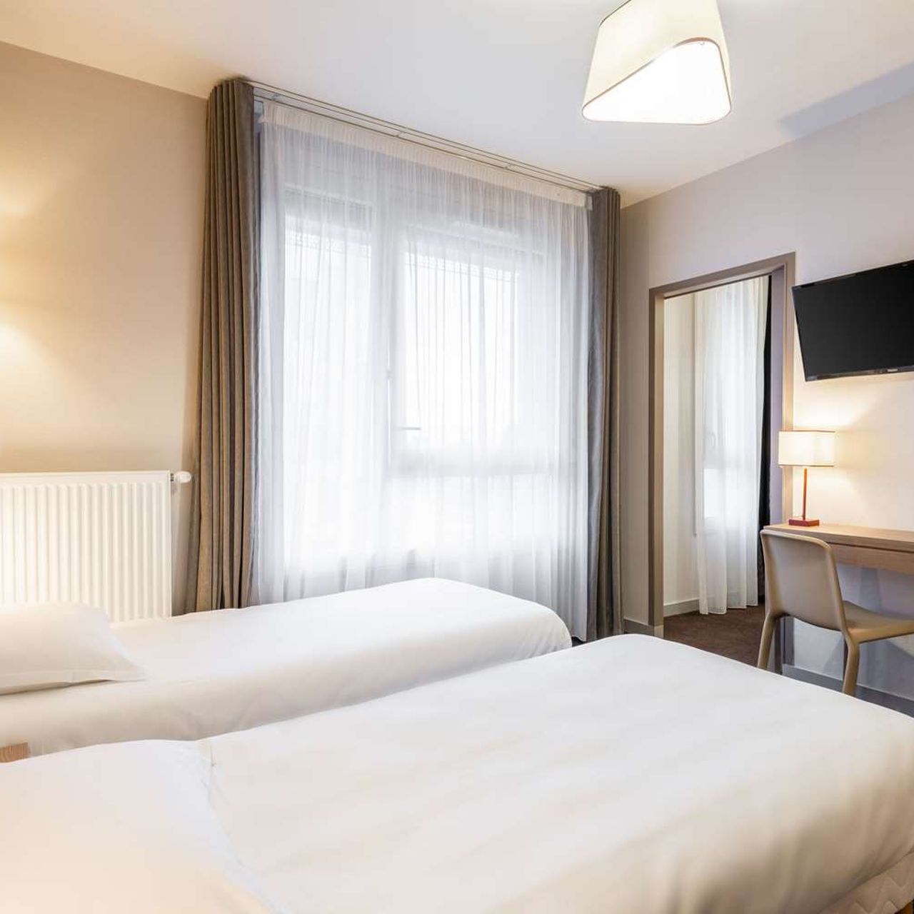 Hotel Nehô Suites Porte de Genève - Annemasse chez HRS avec services  gratuits