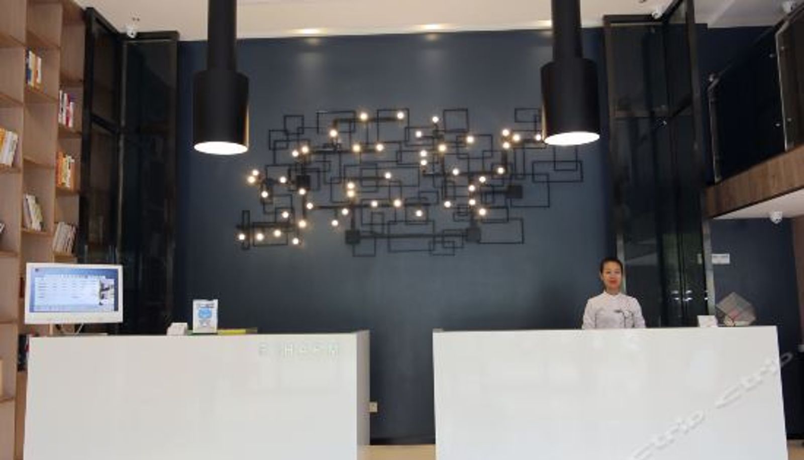 Rezeption - Echarm Hotel (Nanning Anji Wanda Plaza)
