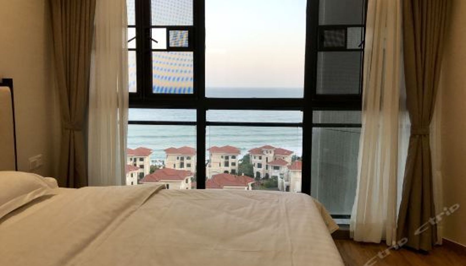 Dreibettzimmer - Haiyue Holiday Apartment