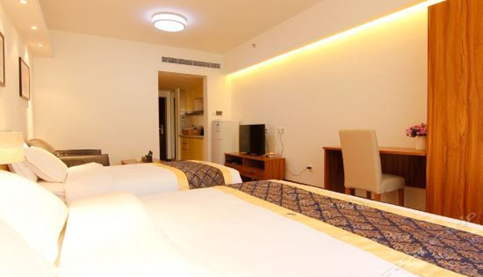 Chambre Familiale - Haoke Guanjia Holiday Apartment (Qingdao Shilaoren Bathing Beach)