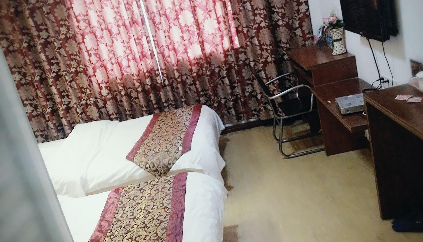 Zimmer - Miaoqiao Business Hotel