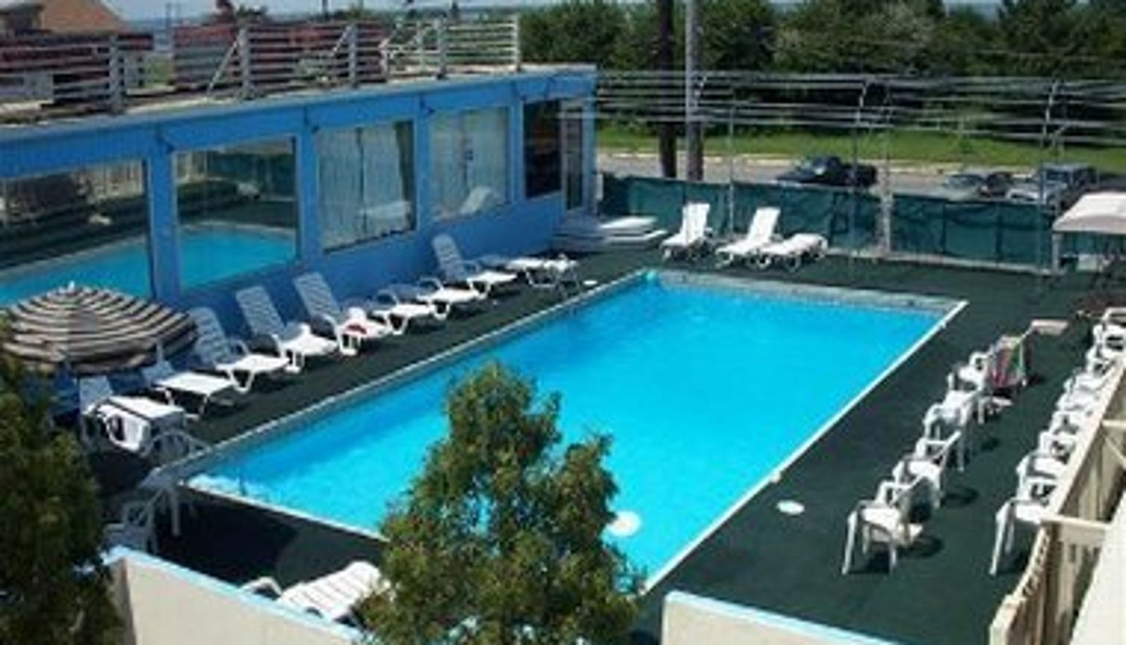 Zona de bienestar y gimnasio - Village Inn