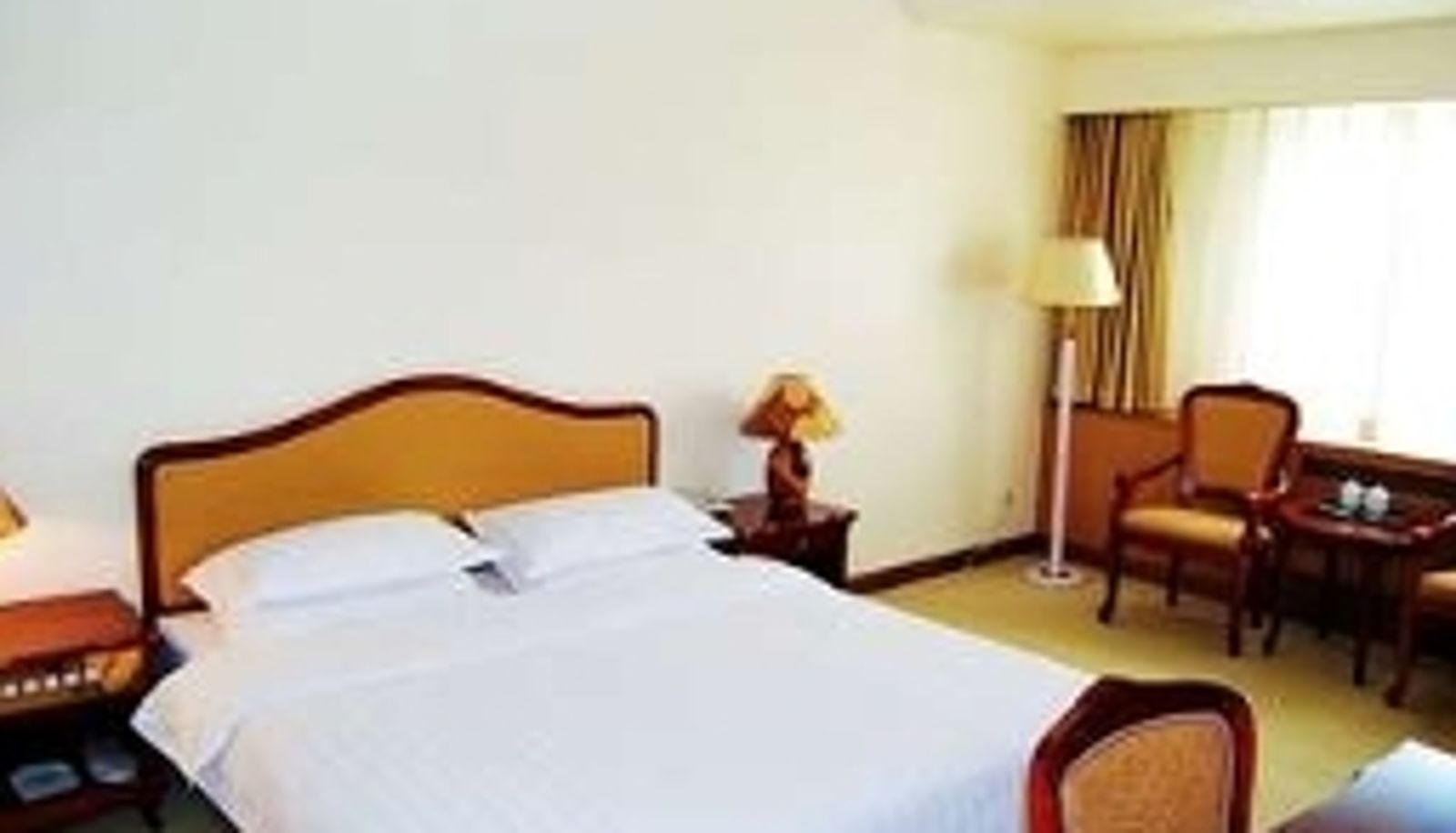 Zimmer - Traveler Inn Hepingli