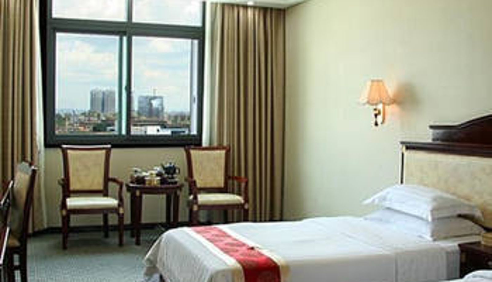 Zimmer - Nanning Happy Meet Hotel (Qingxiu Wanda Jinhu Square Subway Station)