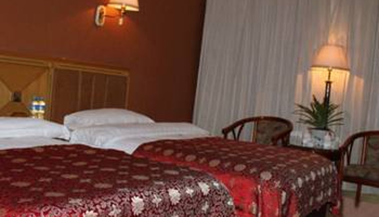 Chambre - Wudu Hotel
