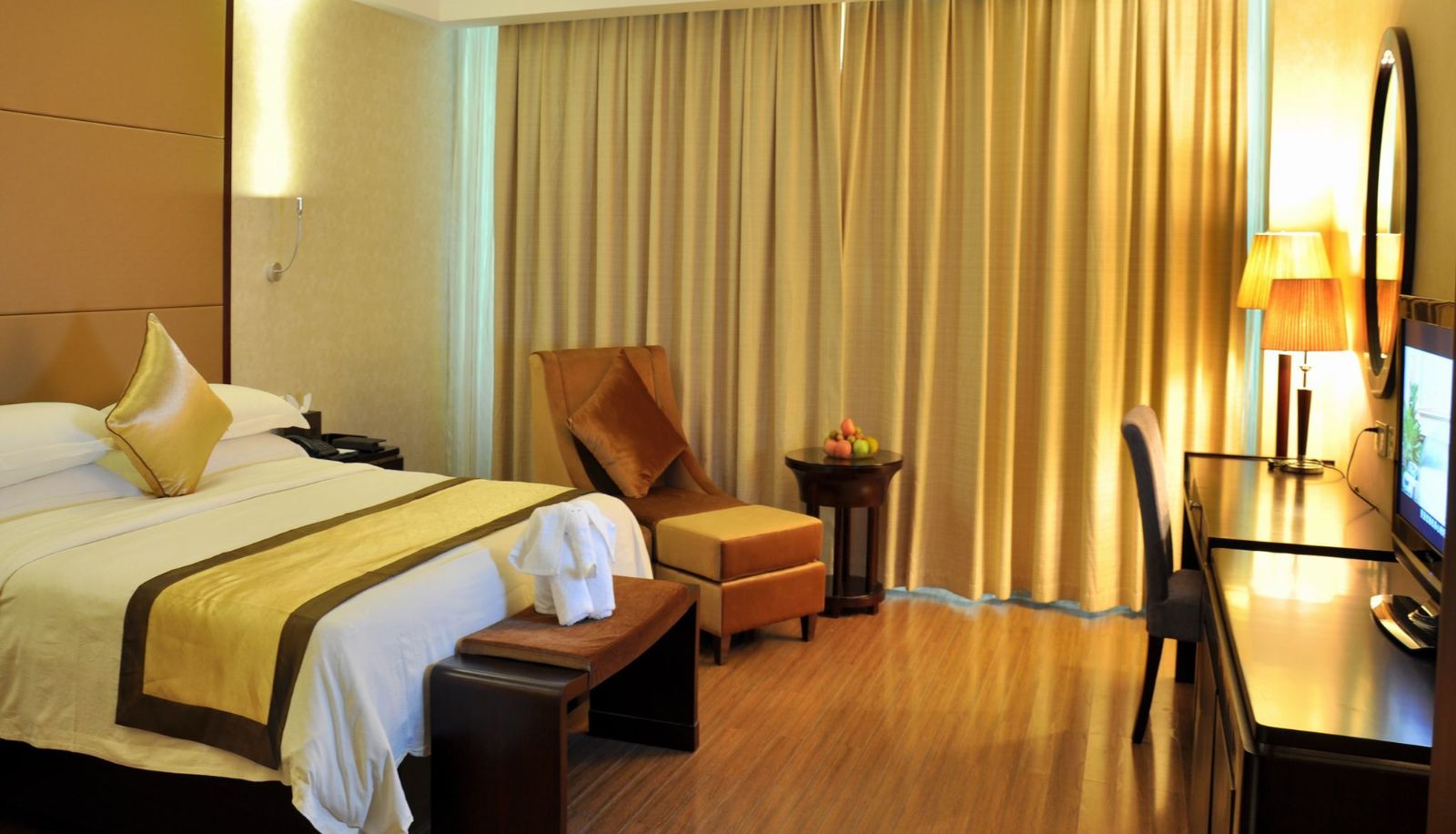 Zimmer mit Seeblick - Conifer Garden Hotel - Haikou