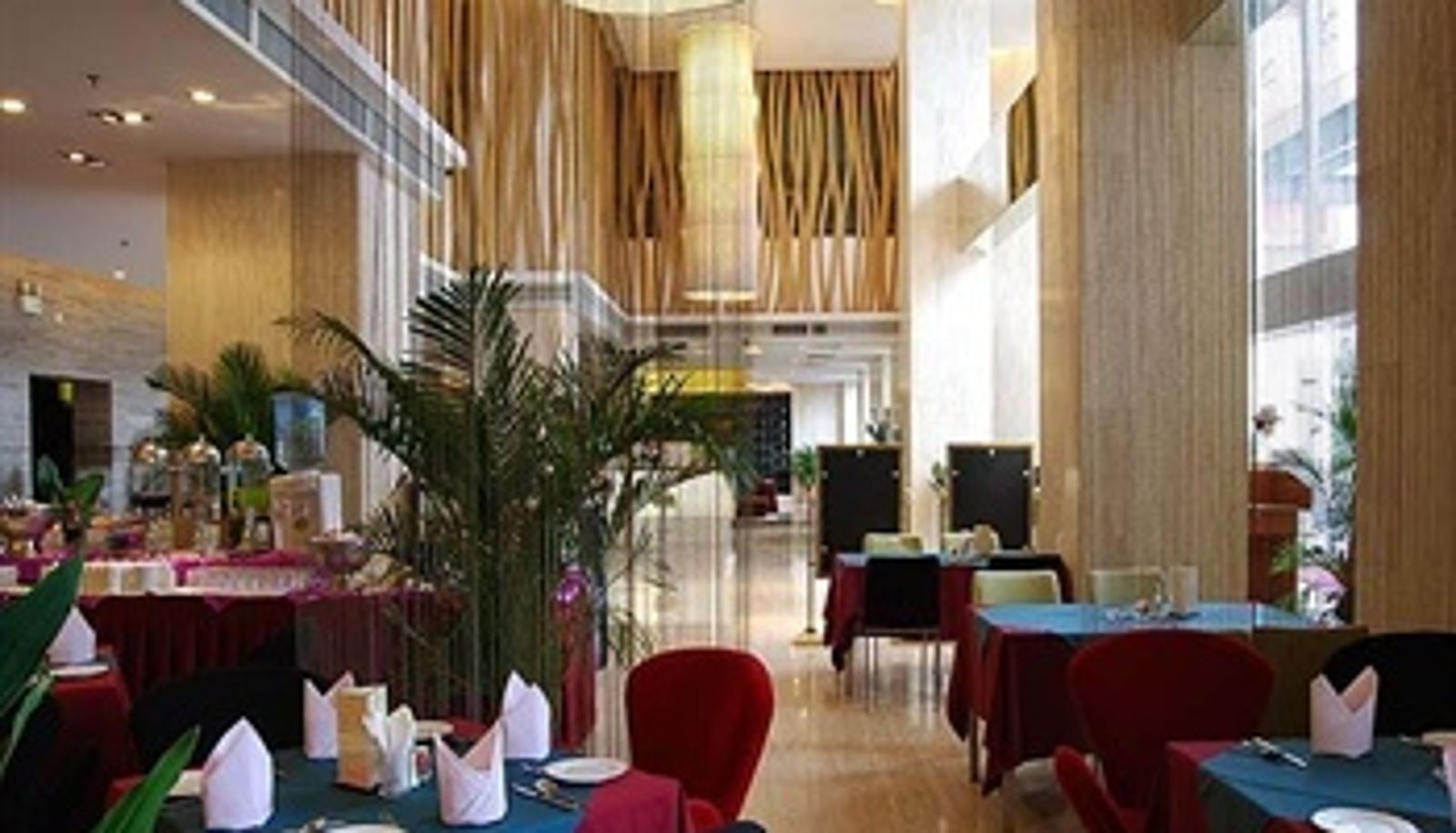 Salle de petit-déjeuner dans le restaurant - Shanshui Hotel Xijiang Road