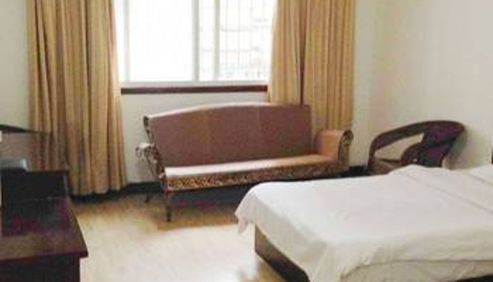 Zimmer - Chunlaimen Business Hotel (Yichang Long Distance Bus Station Store)