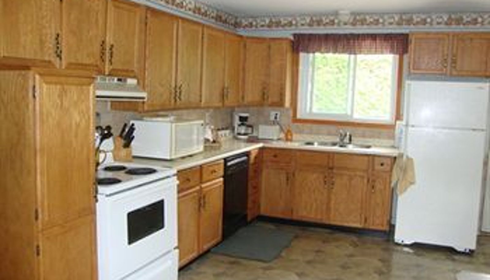 Kuchnia w pokoju - Port Hope Holiday Home