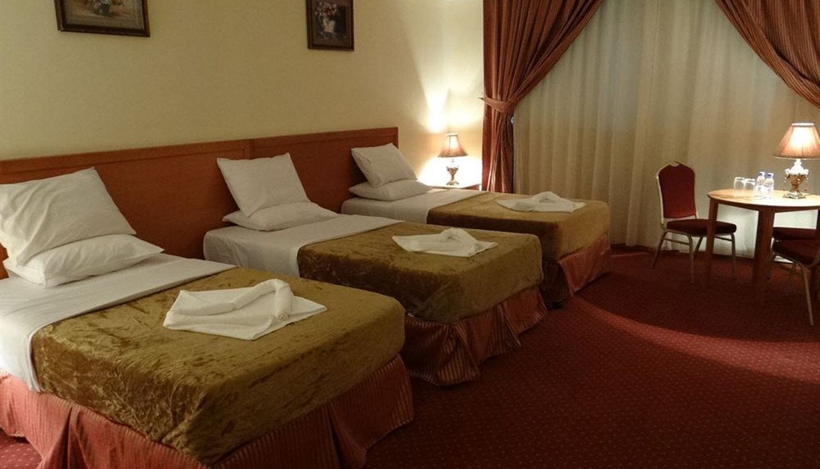 Dreibettzimmer - Rowaa Golden Hotel